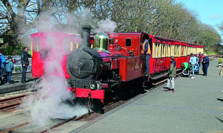 No. 12 Hutchinson awaits departure
from the popular intermediate station of
Castletown with a train from Douglas to
Port Erin on April 10.
