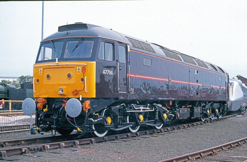 ‘Royal’ loco No. 47798 (formerly 1656), was one of a pair of Class 47s (the other was No. 47799) employed on Royal Train duties (and painted accordingly) between 1995-2004. The machine is seen at the NRM, York, on May 25, 2004 where it is now preserved.